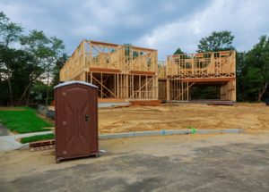 porta potty at a new home construction site